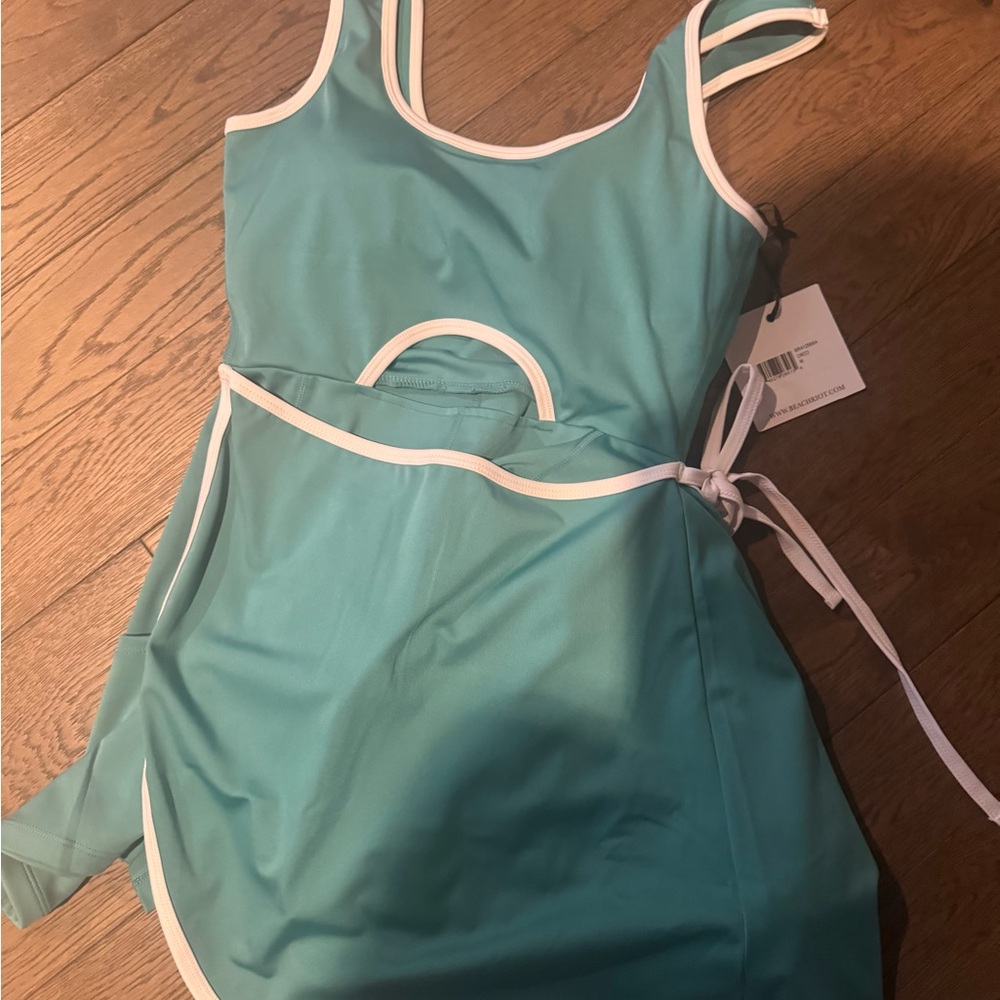Teal athletic dress with White Trim